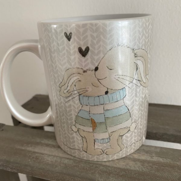 Perlglanztasse: Kuscheln