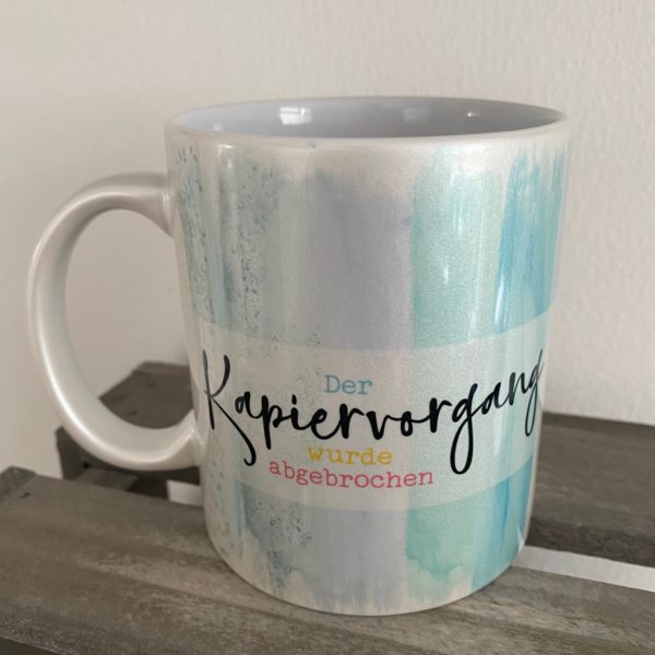 Perlglanztasse: Kapiervorgang